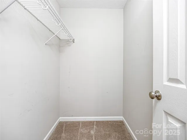 a view of a room with rack on the wall