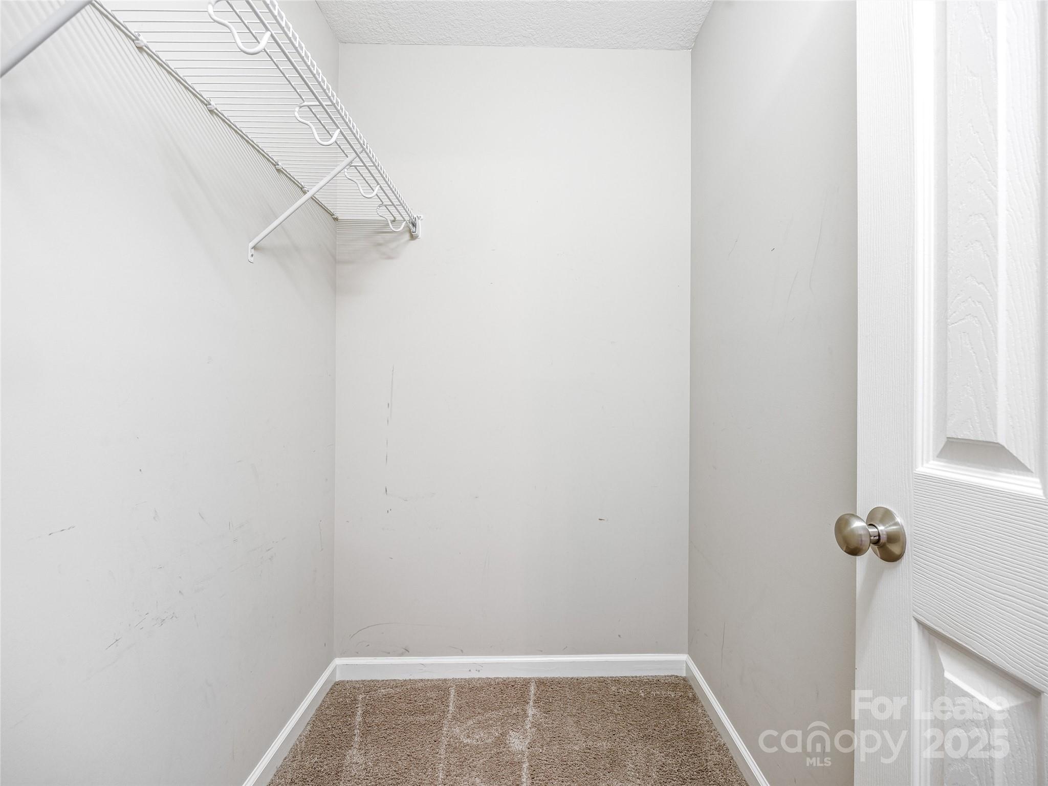 51 Driftstone Circle Arden, NC 28704 - Photo 37 of 38 a view of a room with rack on the wall