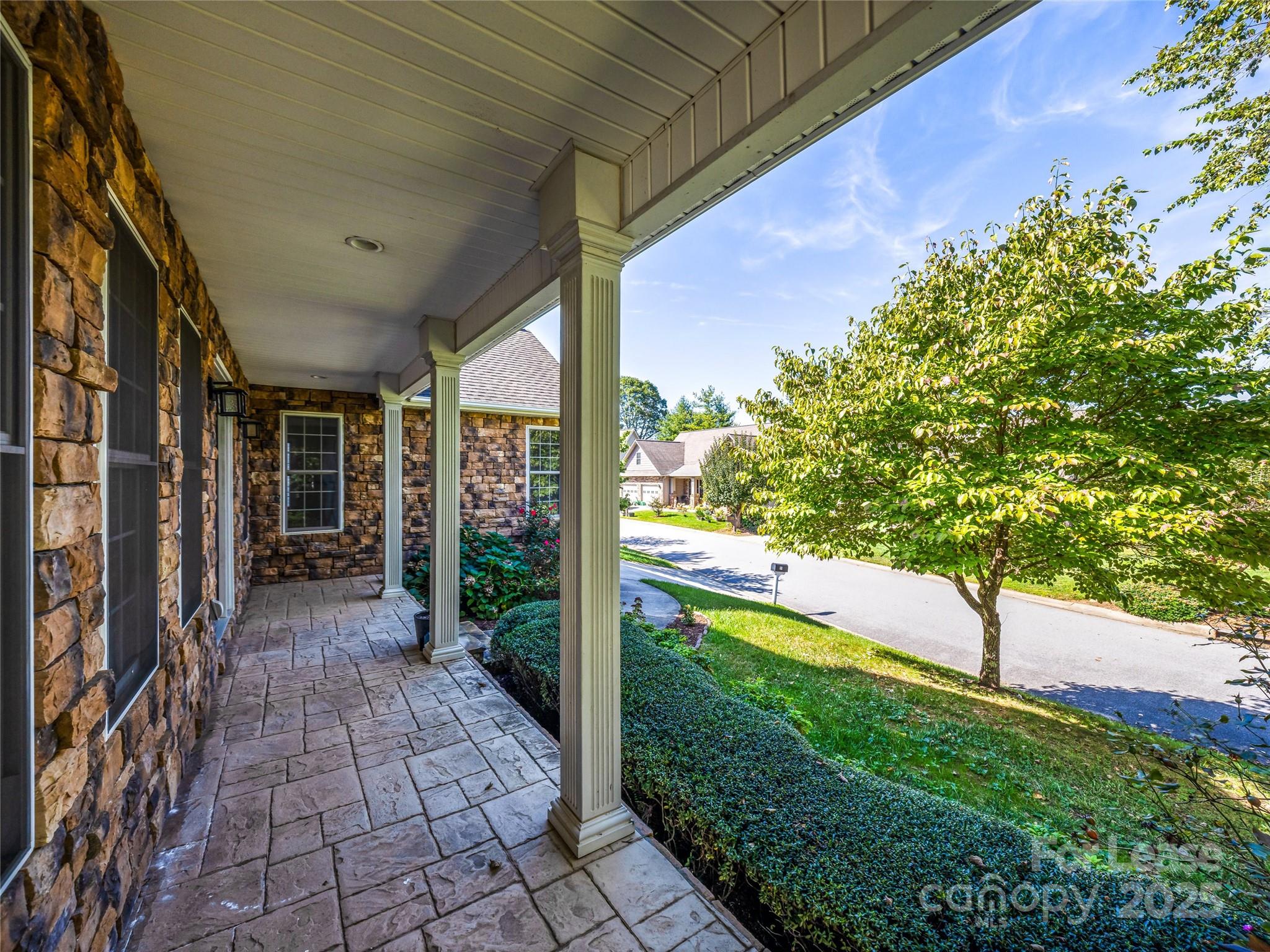51 Driftstone Circle Arden, NC 28704 - Photo 5 of 38 a view of a porch with a yard