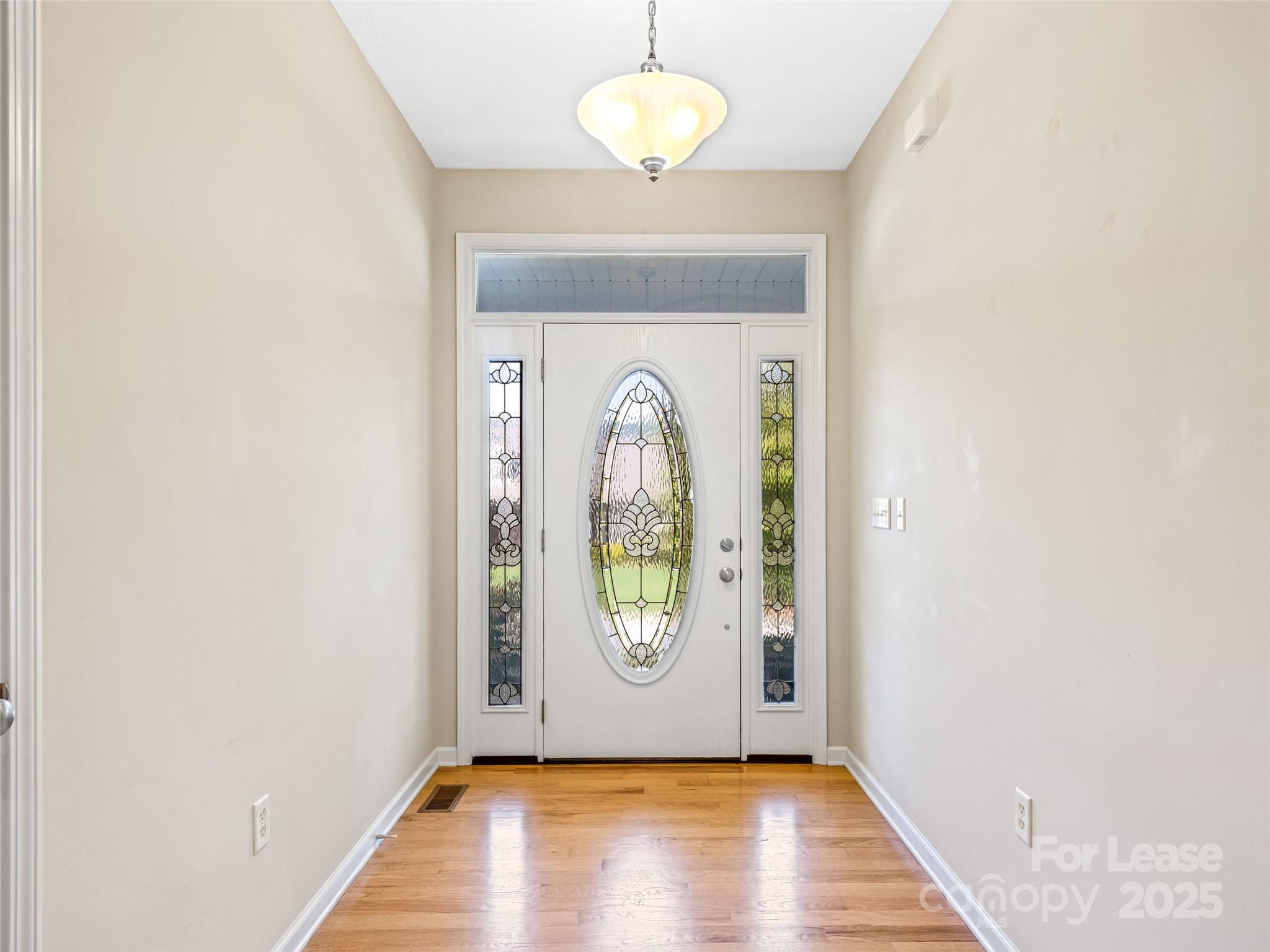 51 Driftstone Circle Arden, NC 28704 - Photo 7 of 38 an empty room with window wooden floor and window