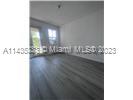 11665 Southwest 244 Street, Unit 116 Homestead, FL 33032 - Photo 24 of 32 a view of empty room with wooden floor