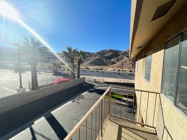 72601 Thrush Road, Unit 4 Palm Desert, CA 92260 - Photo 7 of 8 a view of a balcony with furniture