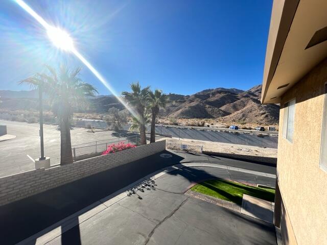 72601 Thrush Road, Unit 4 Palm Desert, CA 92260 - Photo 8 of 8 a view of a balcony with an outdoor space