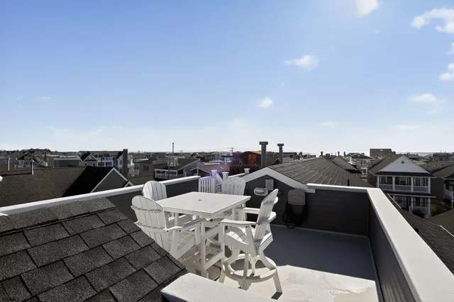 a view of a terrace with chairs