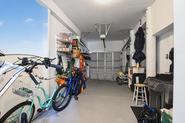 an aerial view of a residential apartment building with a yard