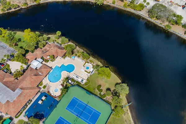 a view of a swimming pool with a patio