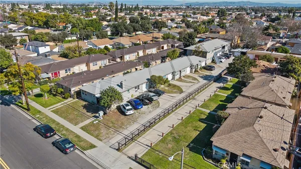 an aerial view of a house with a garden