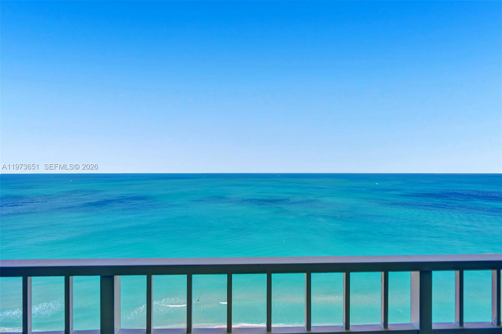 10205 Collins Avenue, Unit P8 Bal Harbour, FL 33154 - Photo 15 of 56 a view of a city from a balcony