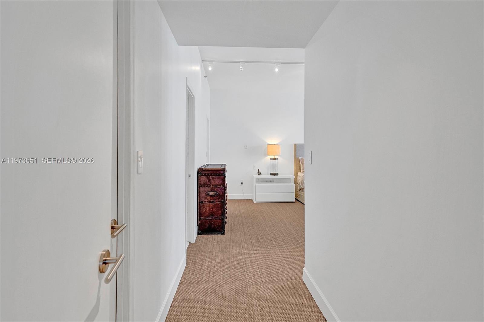 10205 Collins Avenue, Unit P8 Bal Harbour, FL 33154 - Photo 33 of 56 a view of a room with a door