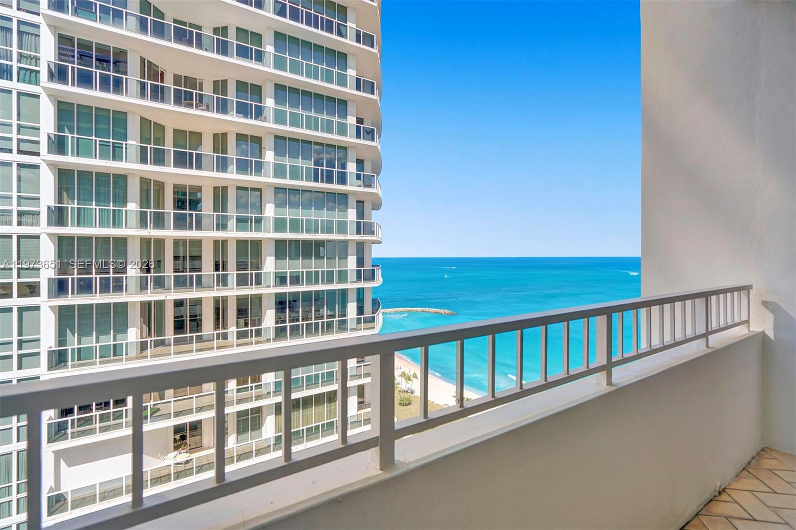 10205 Collins Avenue, Unit P8 Bal Harbour, FL 33154 - Photo 43 of 56 a view of a building from a balcony