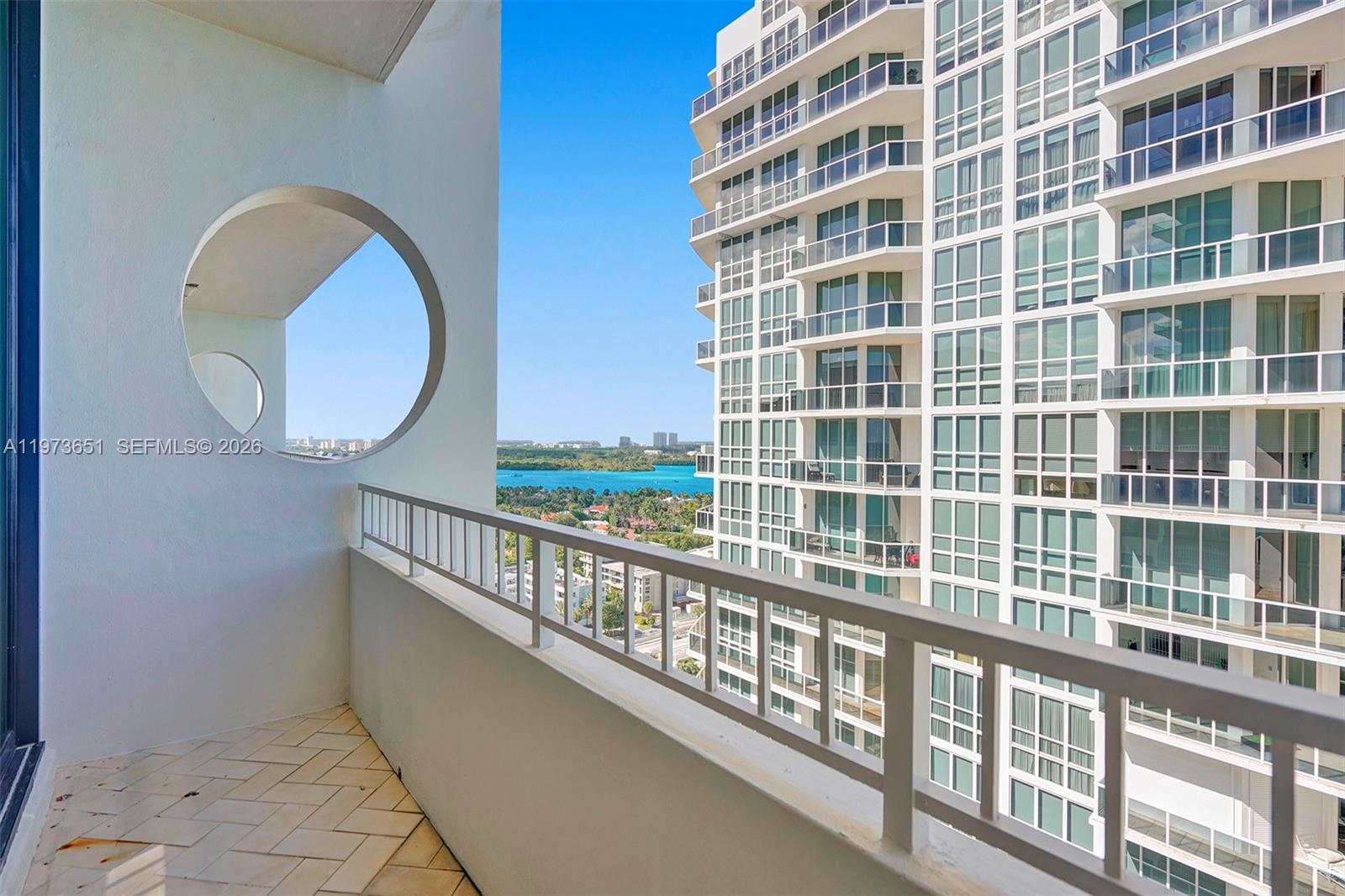 10205 Collins Avenue, Unit P8 Bal Harbour, FL 33154 - Photo 54 of 56 a view of a building from a balcony