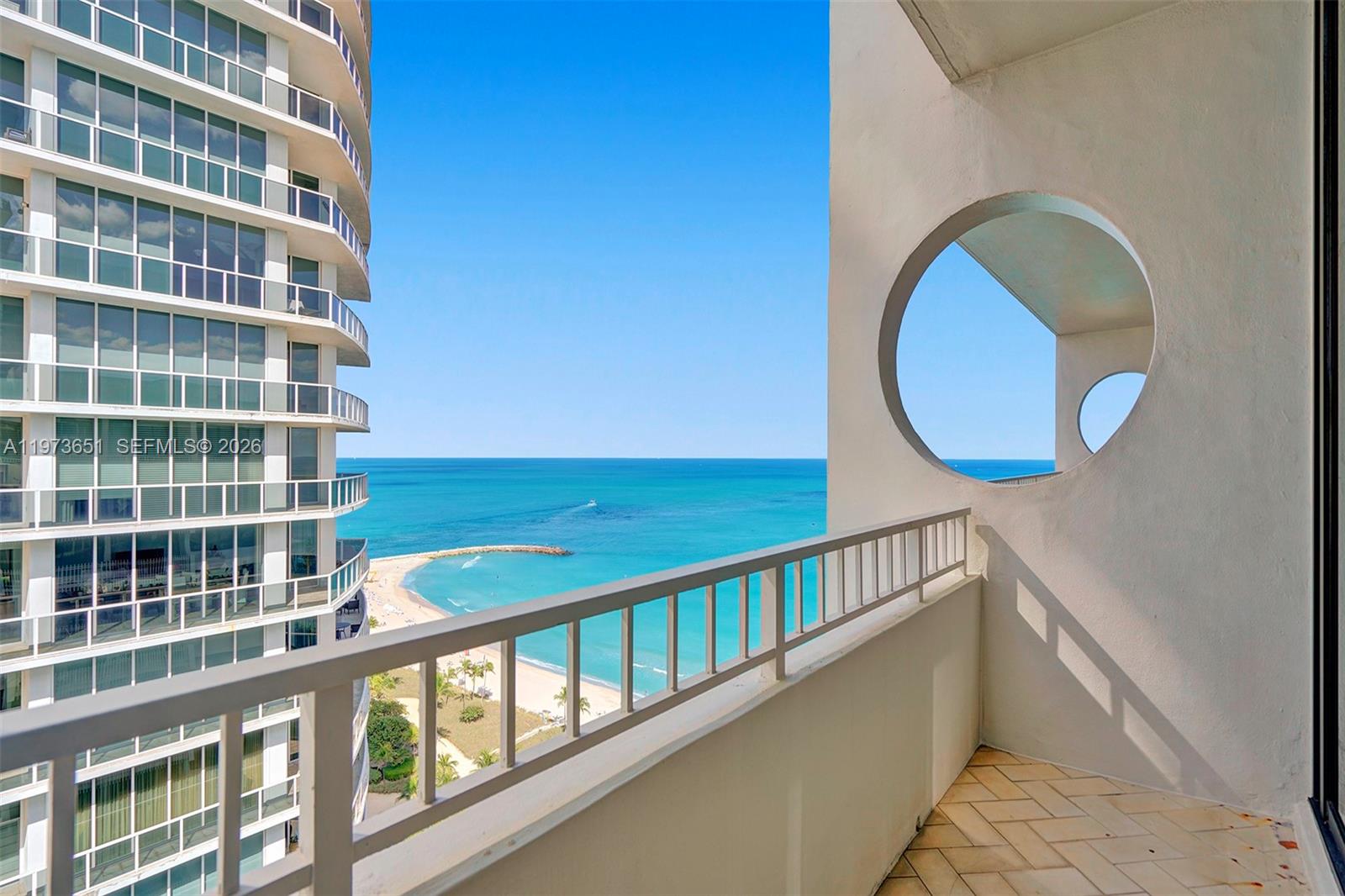 10205 Collins Avenue, Unit P8 Bal Harbour, FL 33154 - Photo 55 of 56 a view of staircase with large window