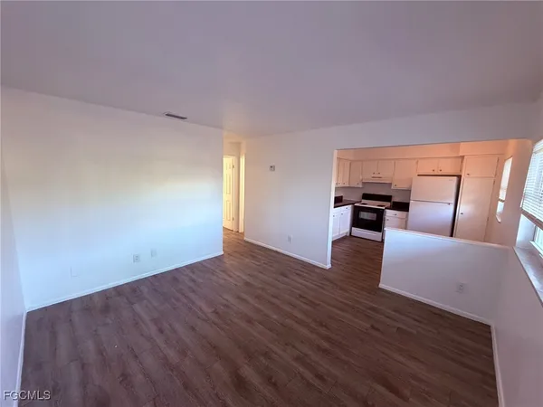 a view of kitchen with livingroom and furniture
