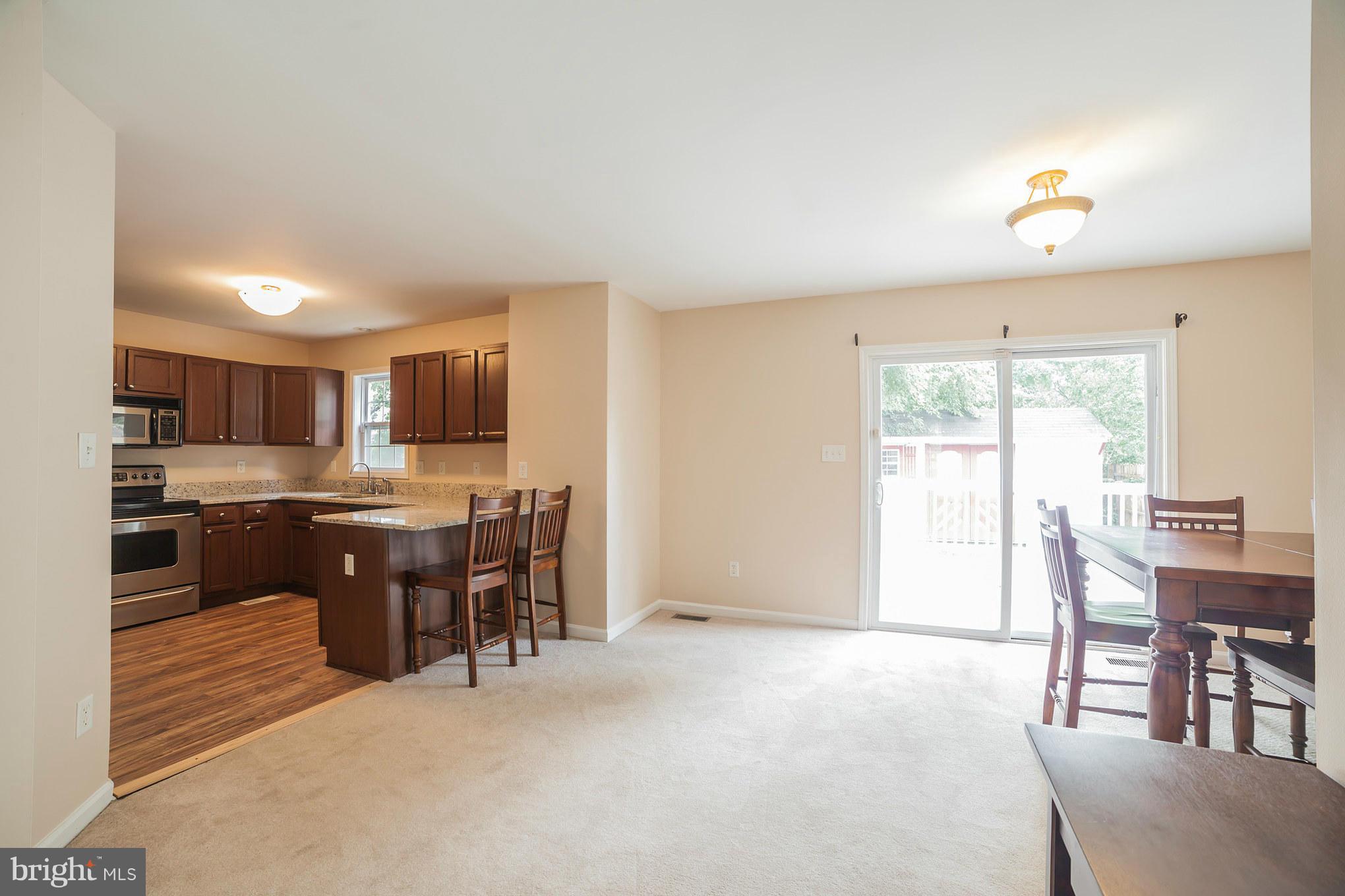 227 Bar Harbor Road Pasadena, MD 21122 - Photo 10 of 30 Separate Dining Room w/ Slider to Backyard