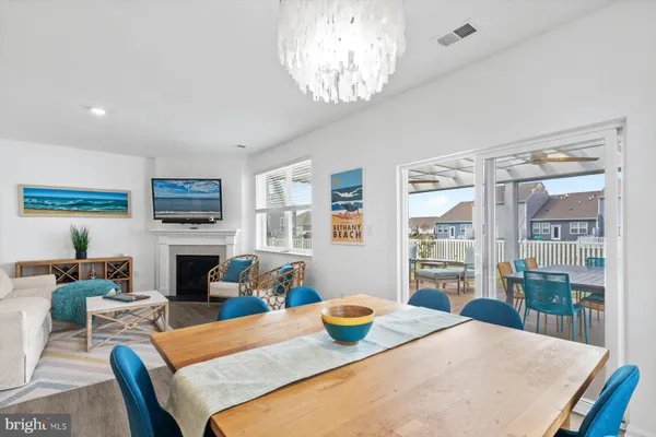 a bedroom with a bed and painting on the wall