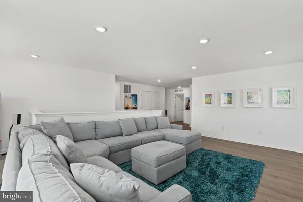 a room with gym equipment and a table