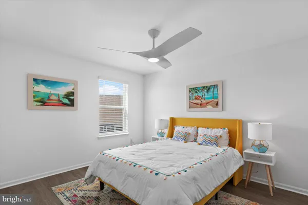 a room with pool table and windows