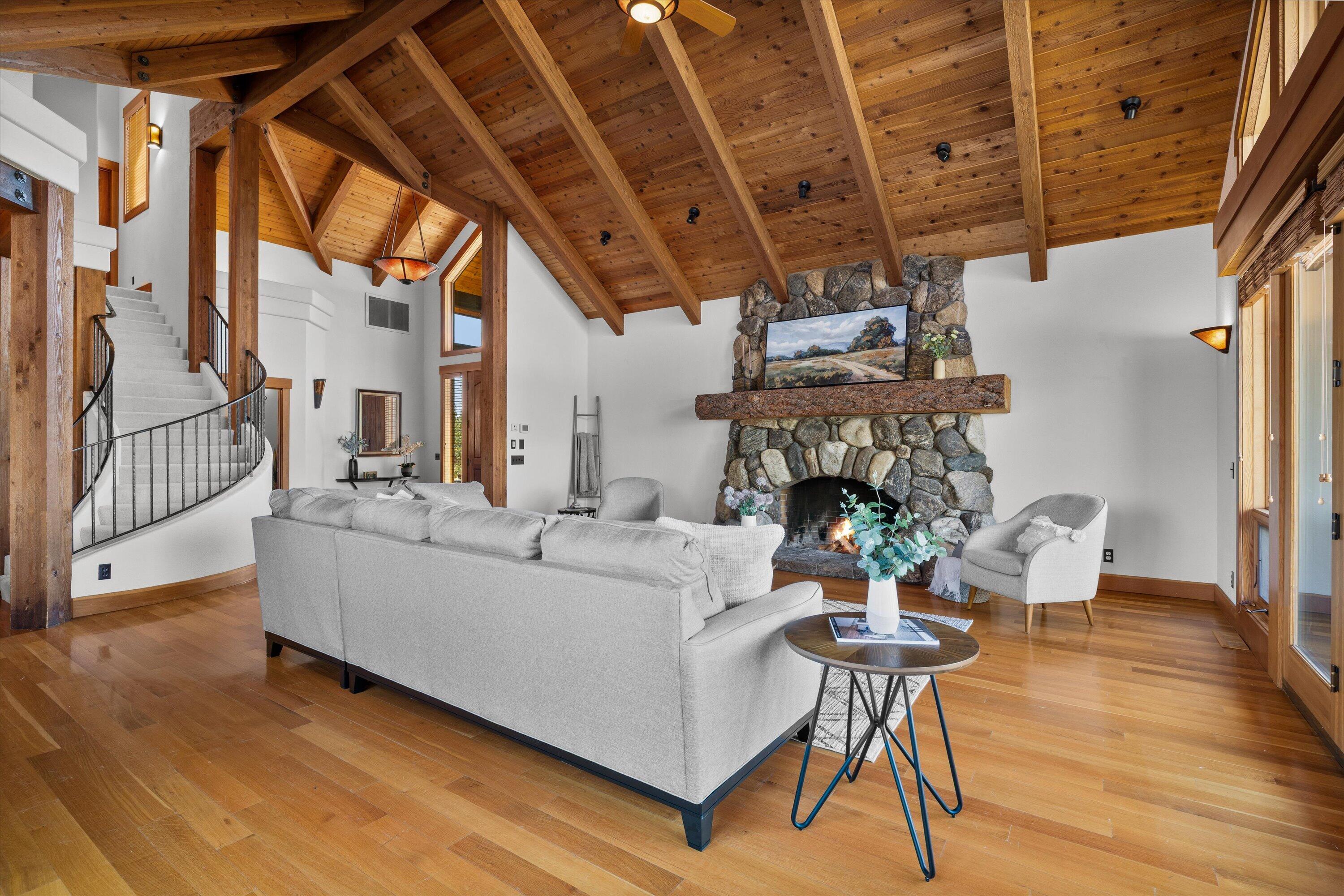 64155 Hunnell Road Bend, OR 97703 - Photo 10 of 96 Hardwood flooring flows throughout the main level.
