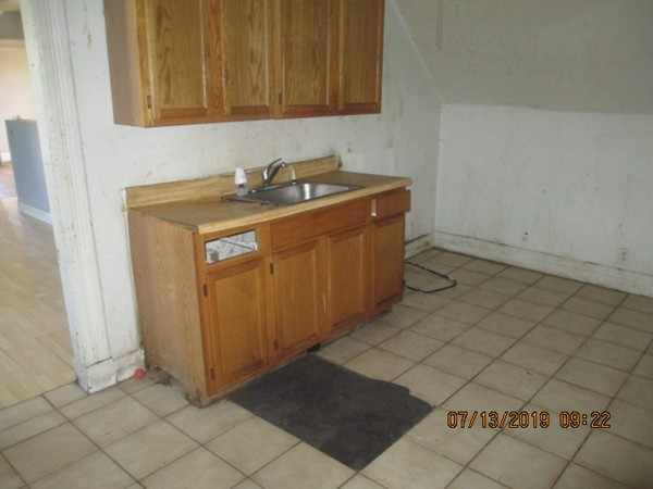 85 Ashley Street Springfield, MA 01105 - Photo 11 of 13 a utility room with a sink