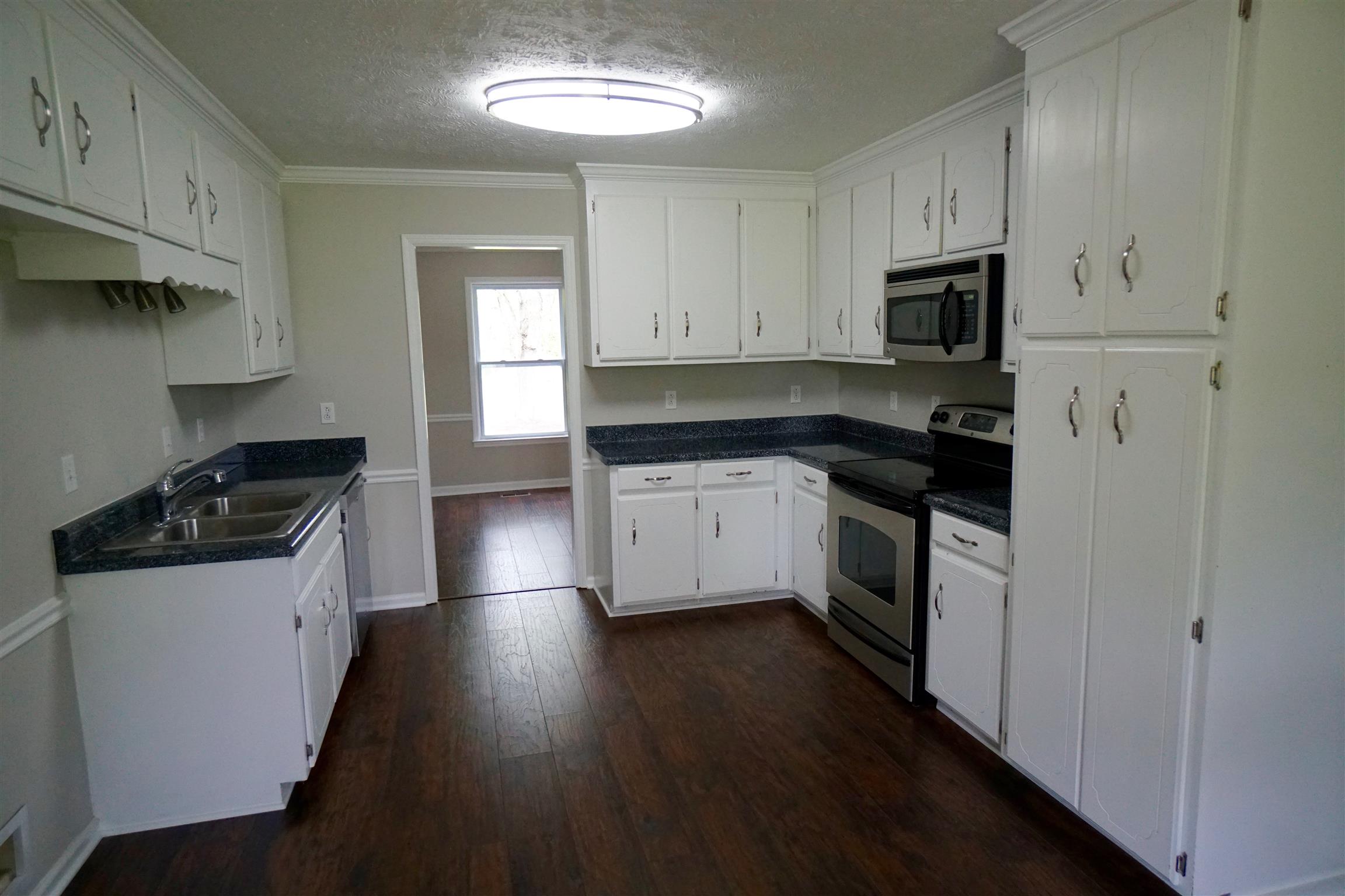 7390 Almaville Road Arrington, TN 37014 - Photo 4 of 15 Stove has gas hookup in place if you ever wanted to change it out.