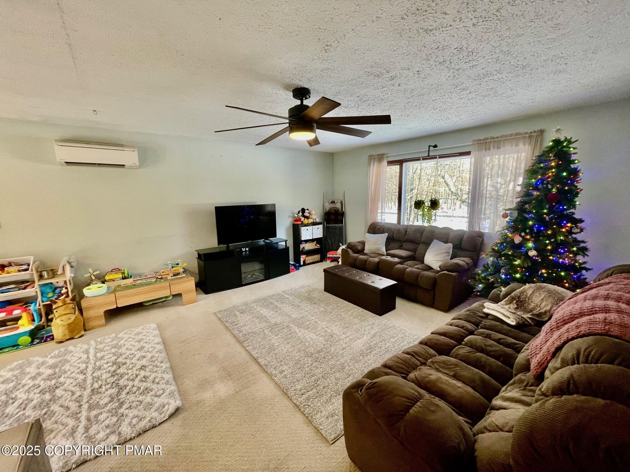 73 Panther Run Road Jim Thorpe, PA 18229 - Photo 20 of 55 a living room with furniture and a flat screen tv