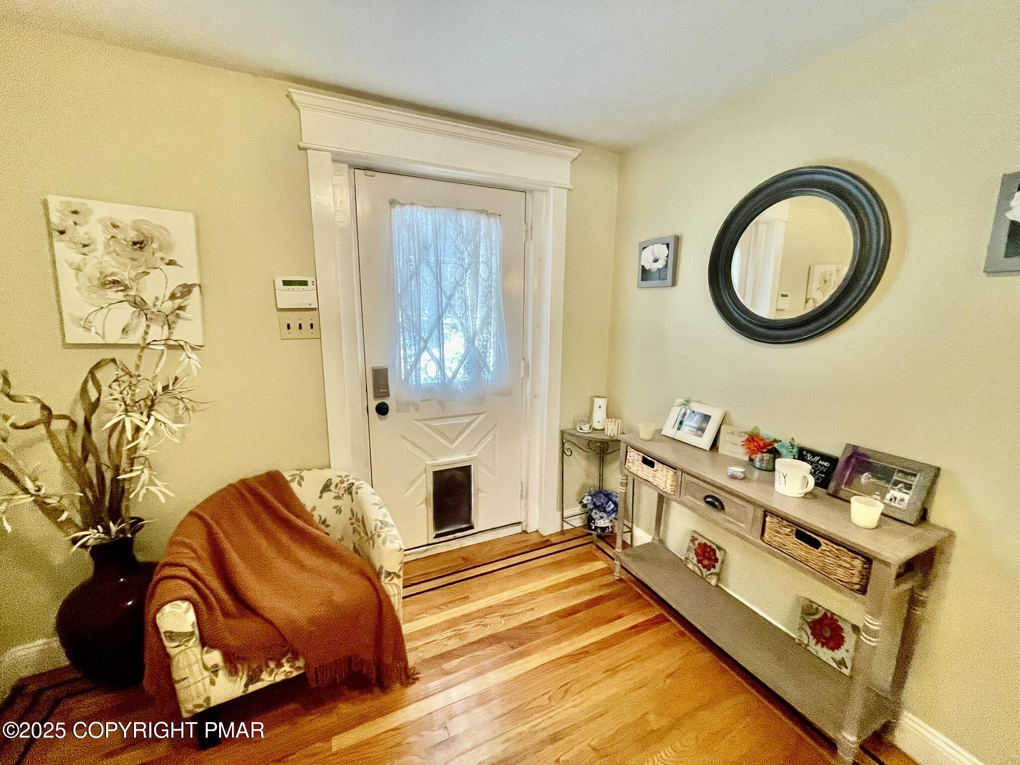 73 Panther Run Road Jim Thorpe, PA 18229 - Photo 3 of 55 a bedroom with a bed and a chandelier