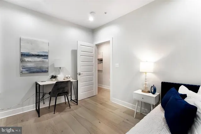 a workspace with furniture and wooden floor