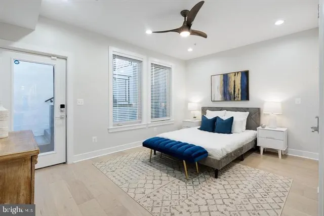 a bedroom with a bed and a view of bathroom