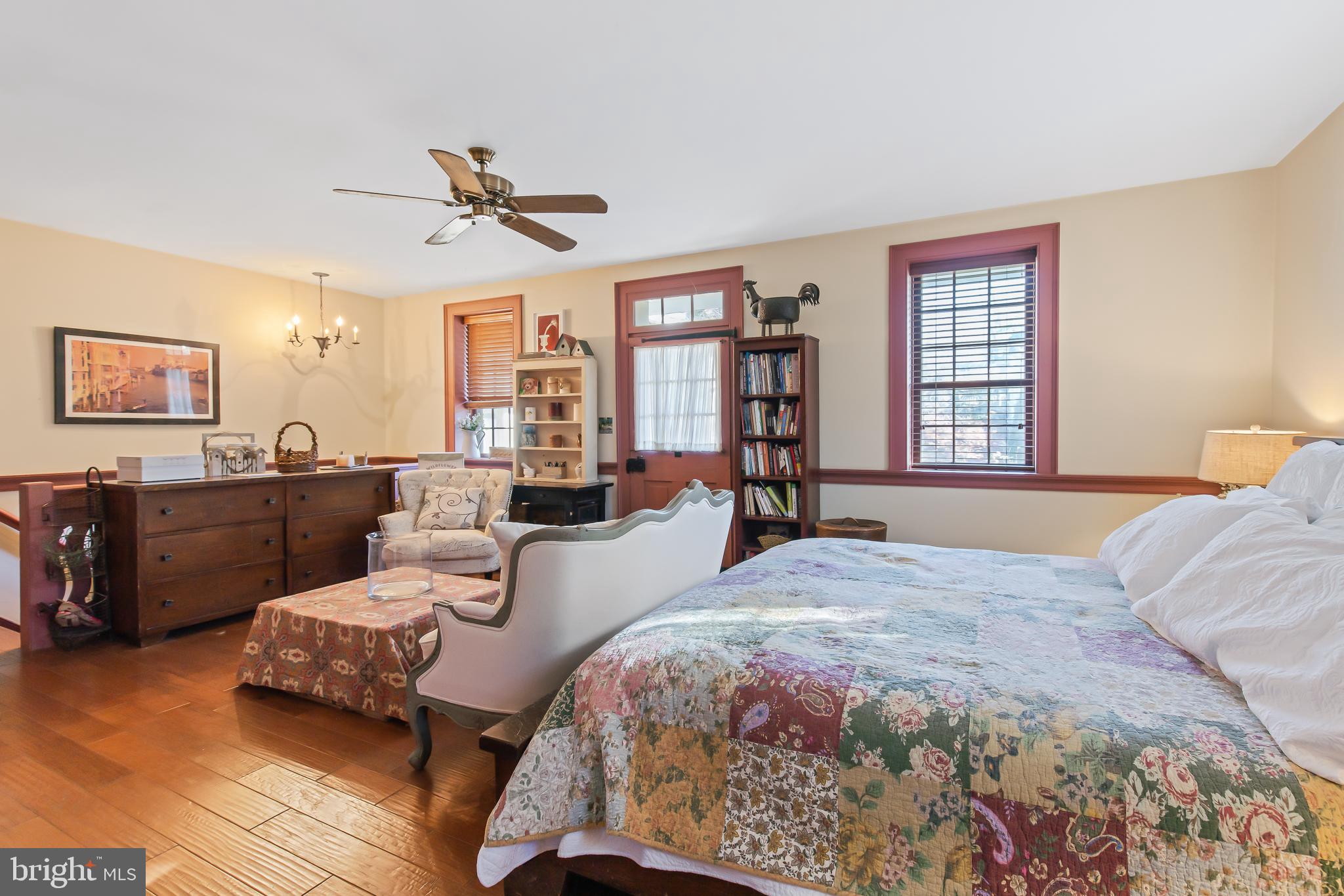 504 2nd Lock Road Lancaster, PA 17603 - Photo 20 of 52 a spacious bedroom with a bed and wooden floor