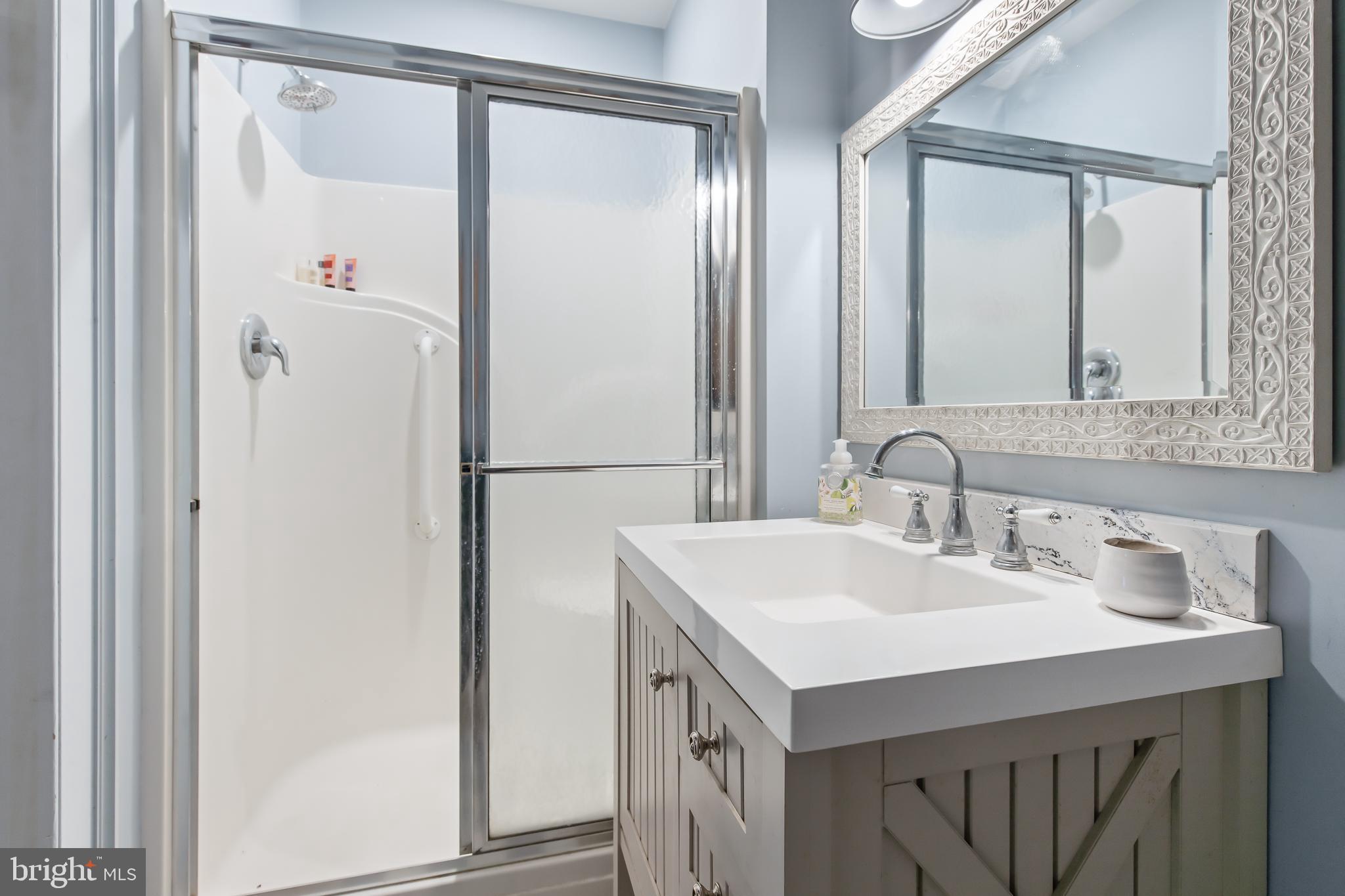 504 2nd Lock Road Lancaster, PA 17603 - Photo 21 of 52 a bathroom with a sink and a mirror