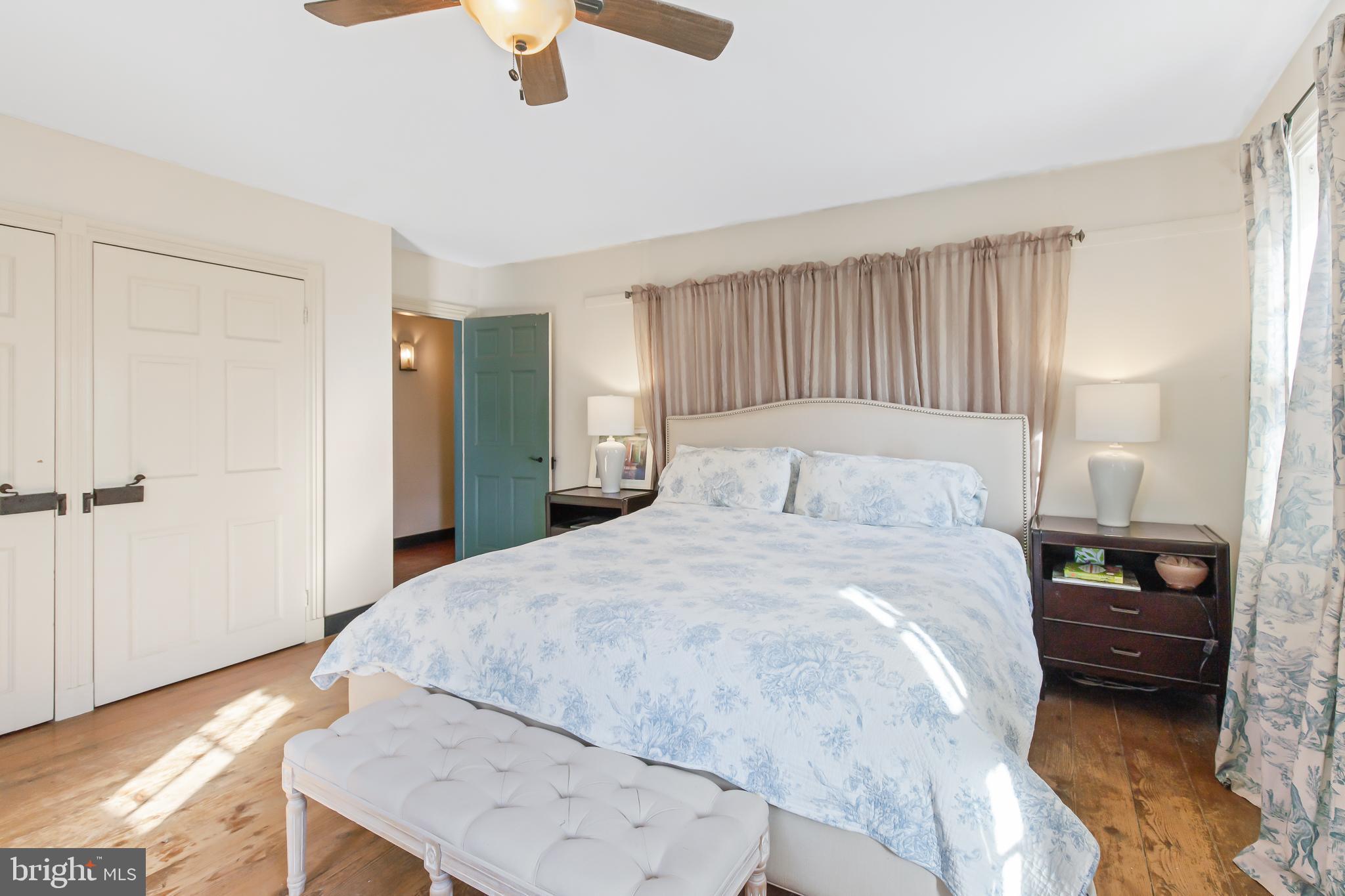 504 2nd Lock Road Lancaster, PA 17603 - Photo 24 of 52 a bedroom with a bed and a chandelier