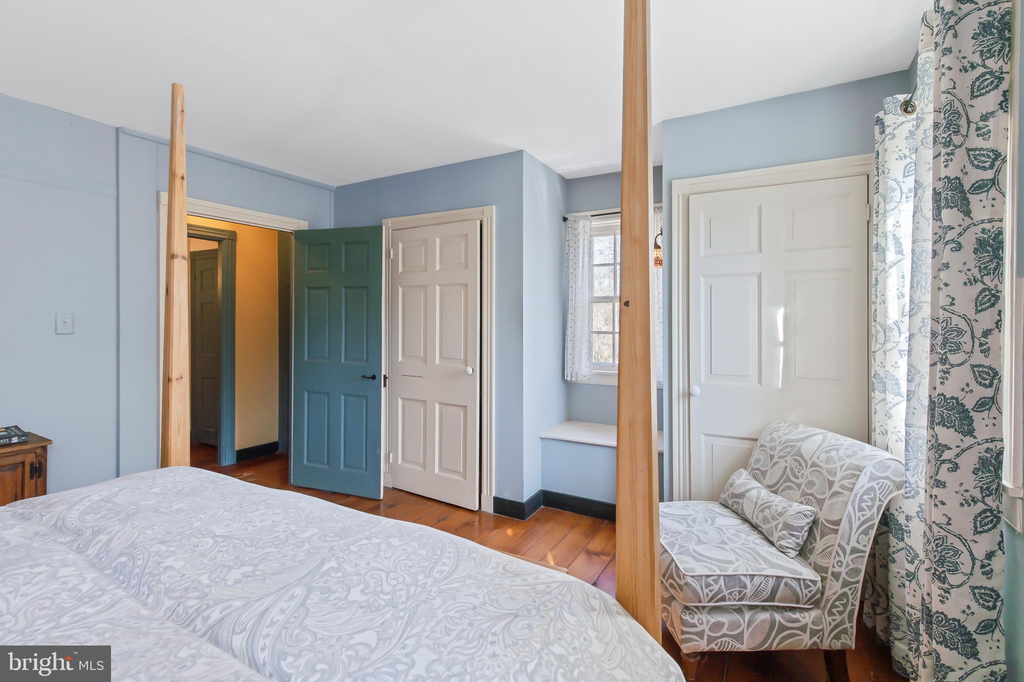 504 2nd Lock Road Lancaster, PA 17603 - Photo 28 of 52 a bedroom with a bed and a chandelier