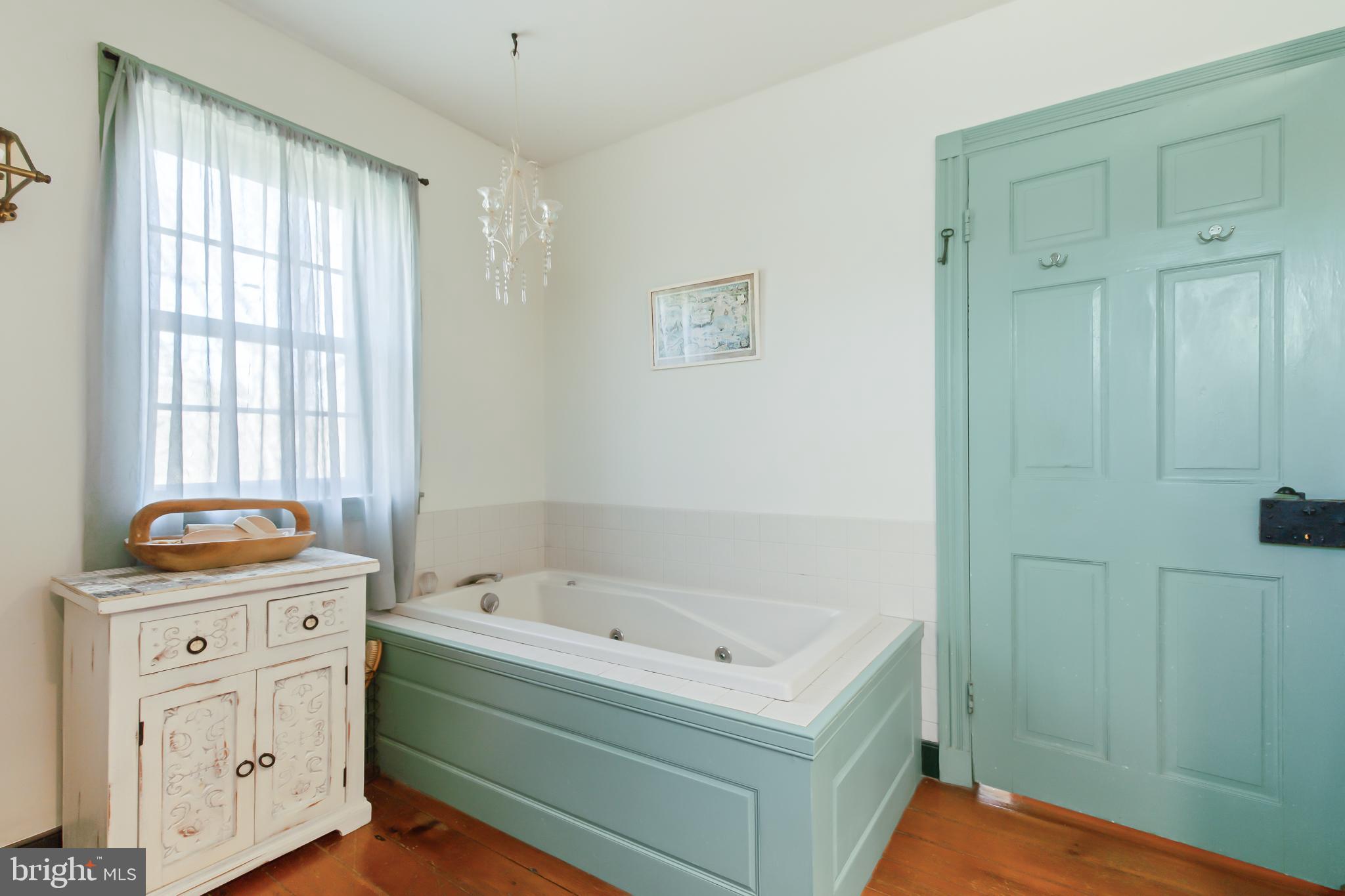 504 2nd Lock Road Lancaster, PA 17603 - Photo 30 of 52 a bath room with a baby crib and a dresser