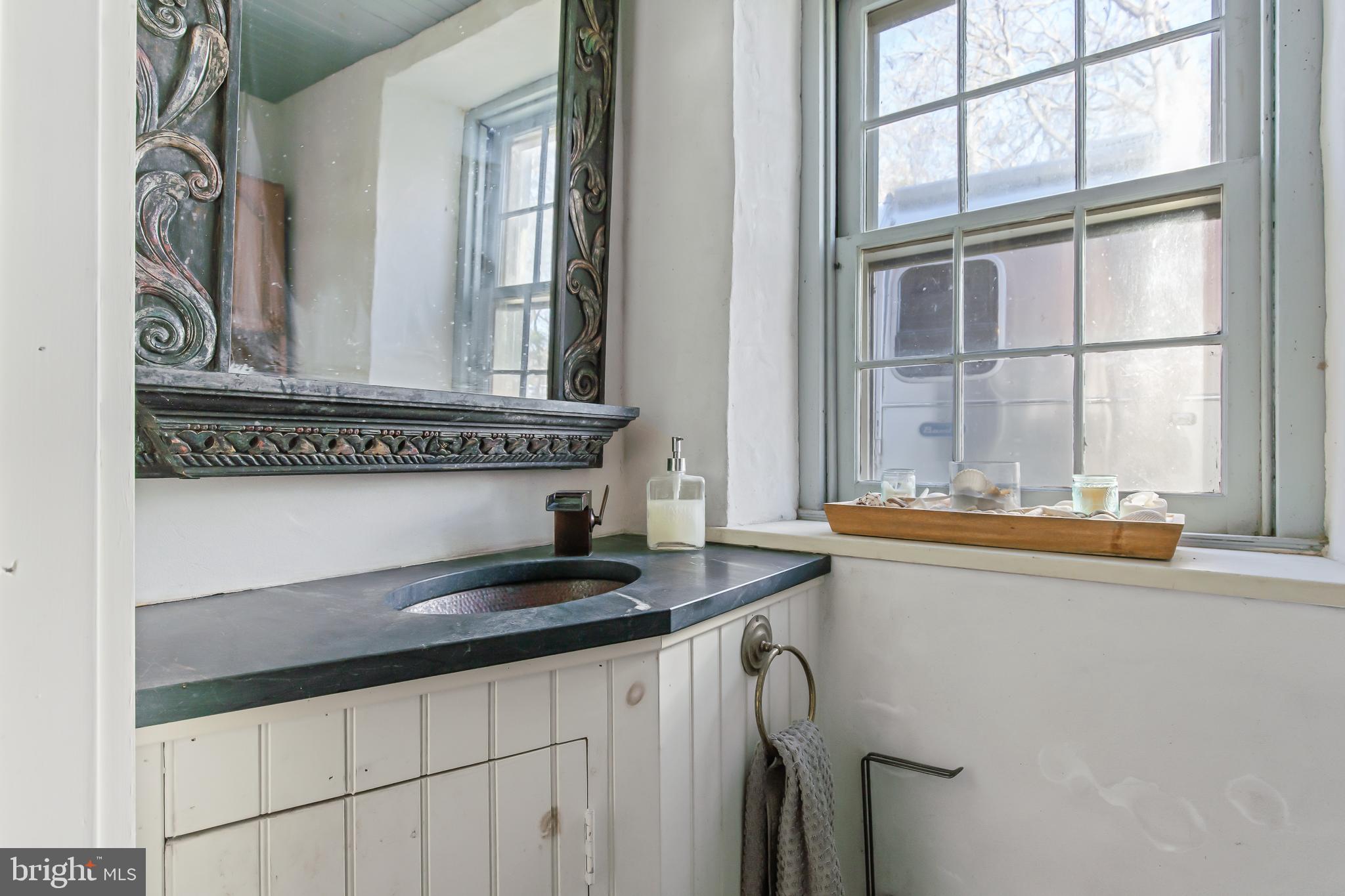 504 2nd Lock Road Lancaster, PA 17603 - Photo 33 of 52 a kitchen with granite countertop a sink and a window