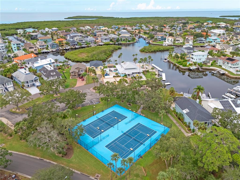 5722 Biscayne Court, Unit 308 New Port Richey, FL 34652 - Photo 27 of 31 an aerial view of residential houses with outdoor space
