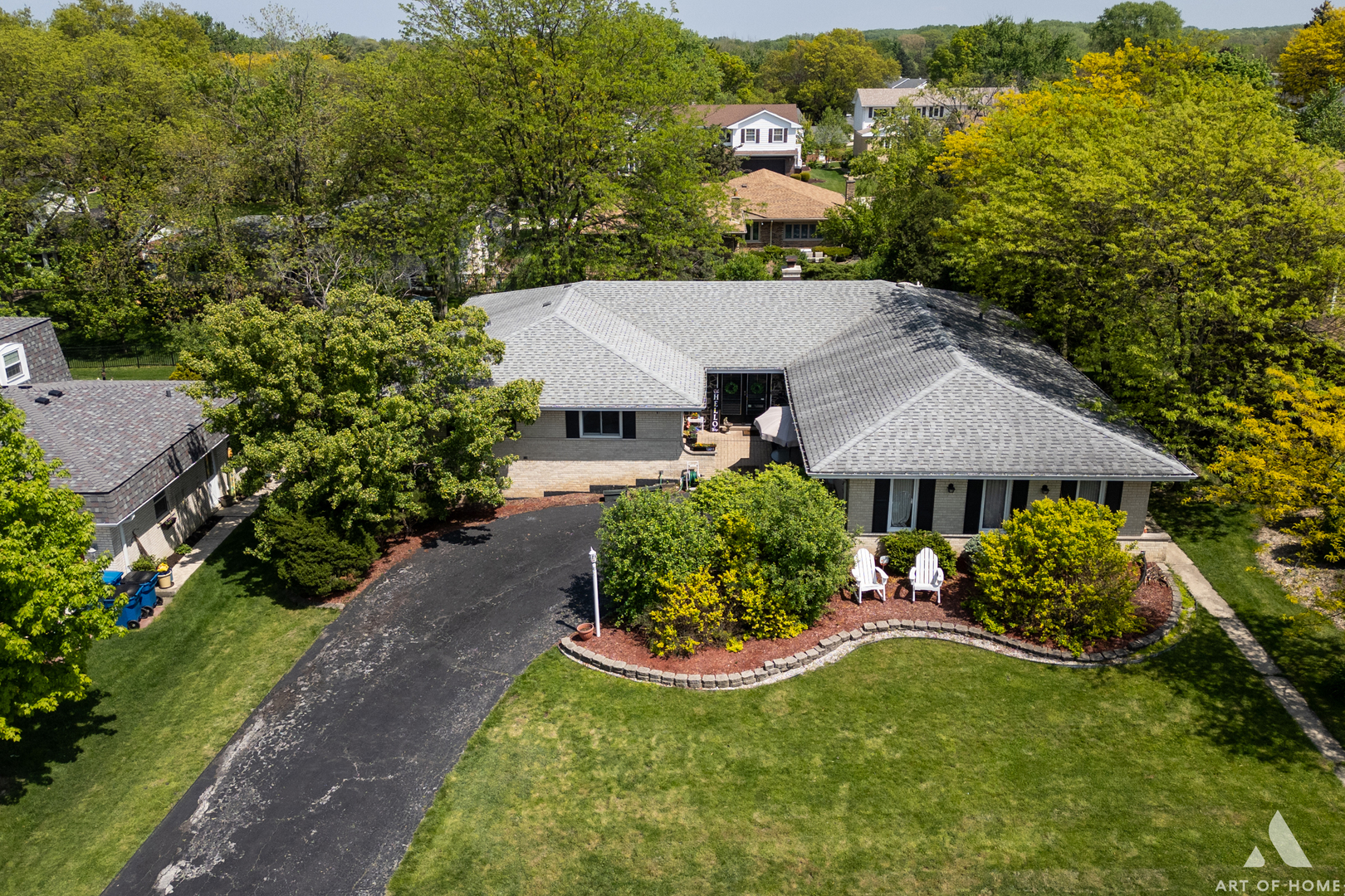 an aerial view of a house with garden