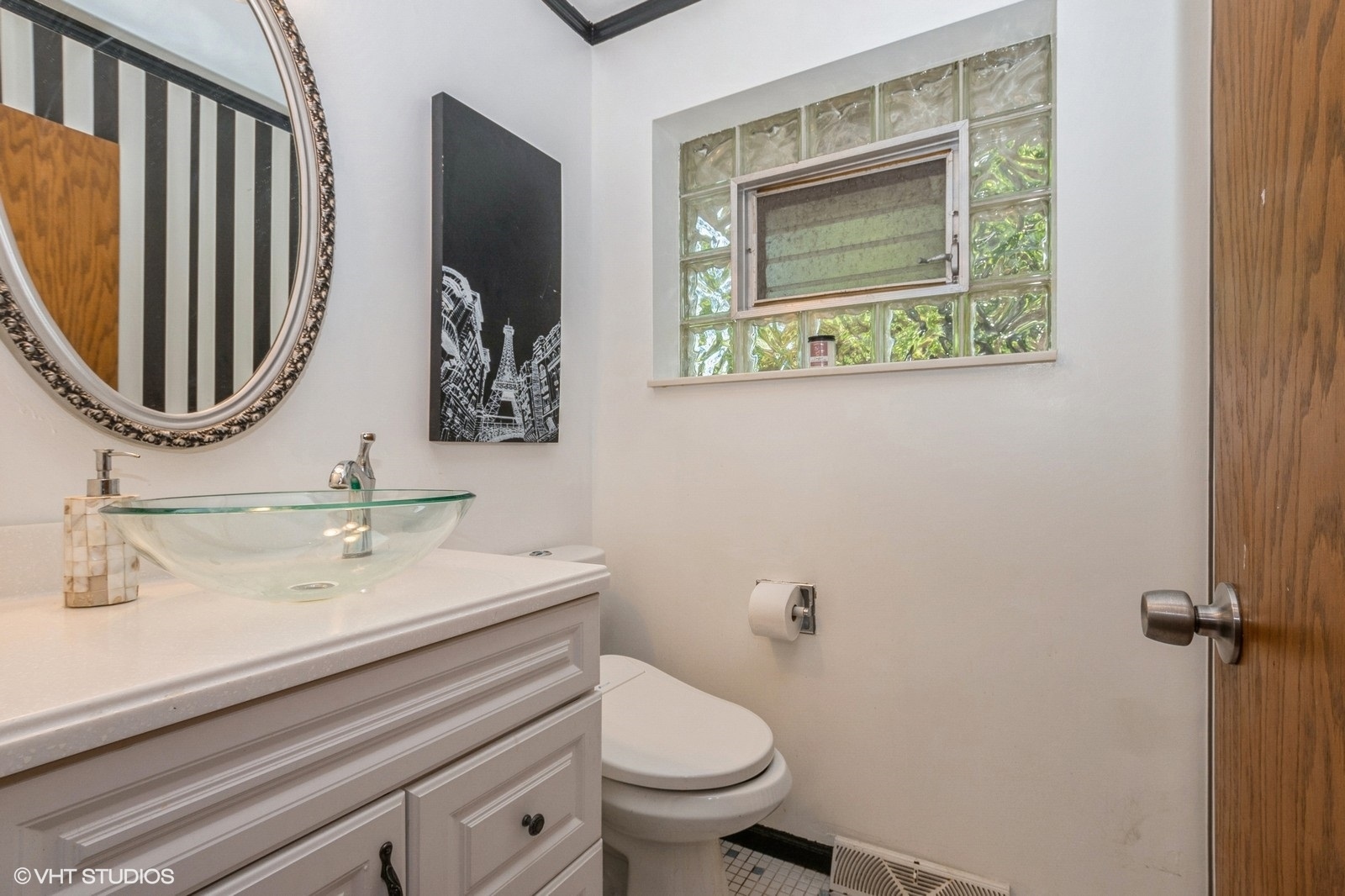 13011 South Shawnee Road Palos Heights, IL 60463 - Photo 9 of 28 a bathroom with a sink and a mirror