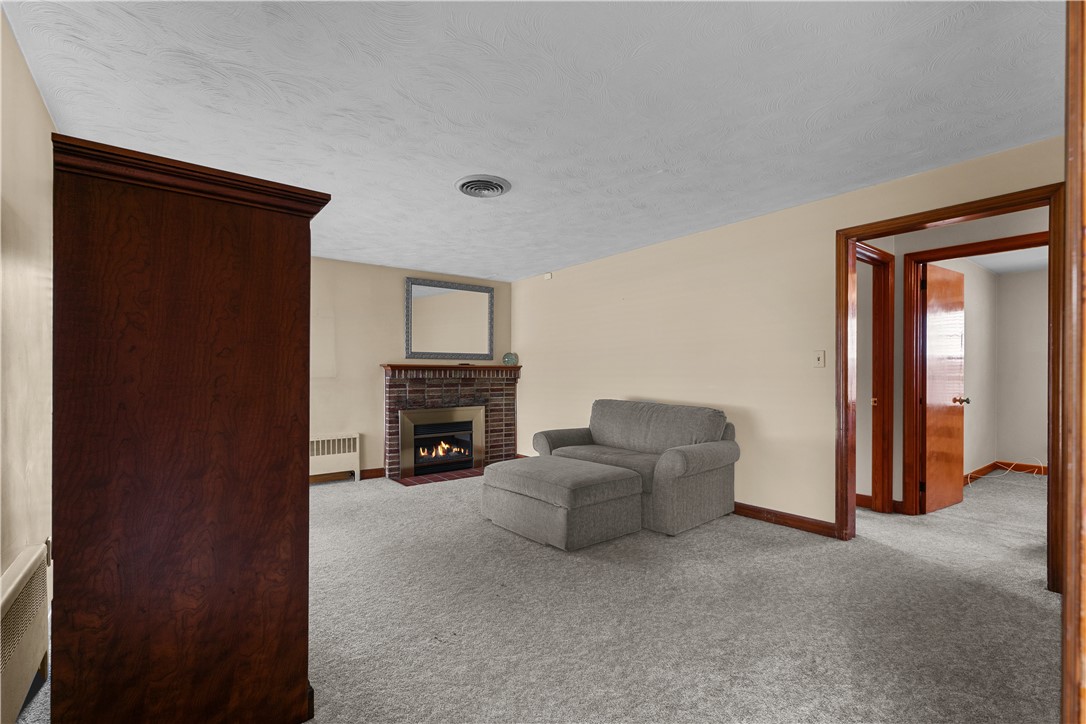 265 Monticello Road Pawtucket, RI 02861 - Photo 4 of 42 Ample Living Room with Carpeting over OAK FLOORS!