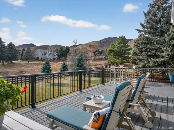 a view of balcony with furniture