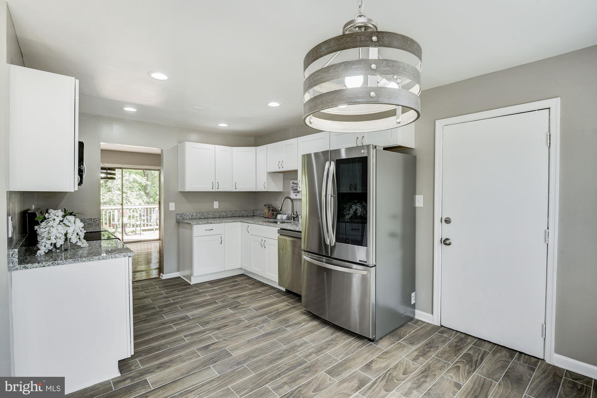 15020 Wellwood Road Silver Spring, MD 20905 - Photo 12 of 38 Added recessed lighting.