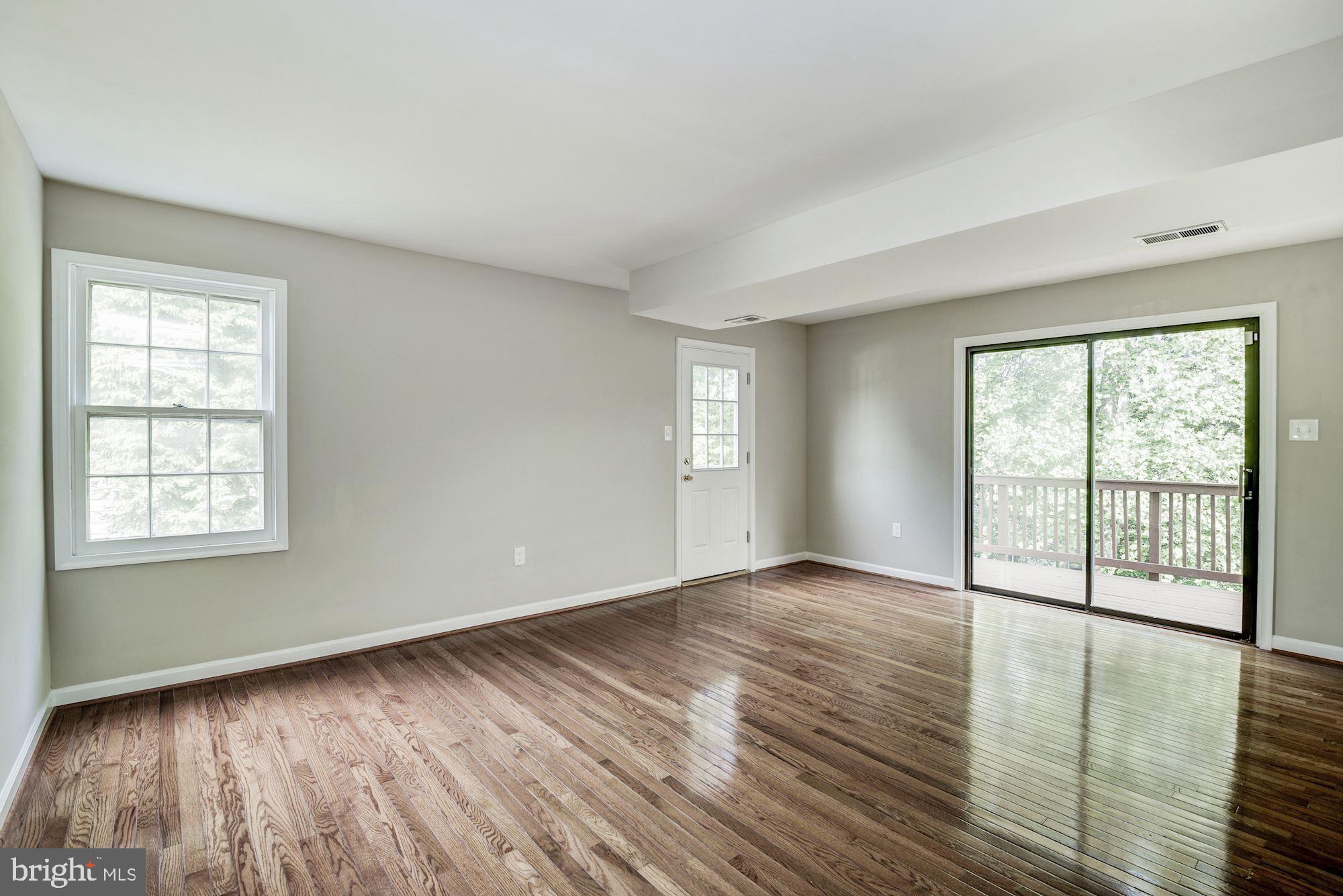15020 Wellwood Road Silver Spring, MD 20905 - Photo 16 of 38 Large office, sep entrance, sliders to deck