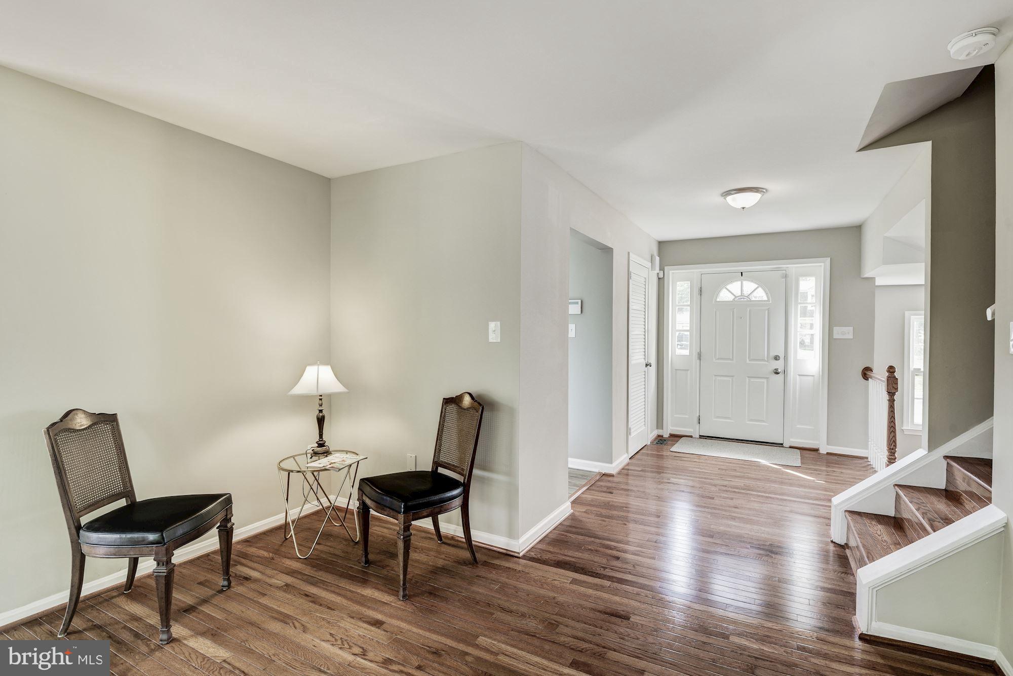 15020 Wellwood Road Silver Spring, MD 20905 - Photo 4 of 38 Bright foyer, new entry hardwoods