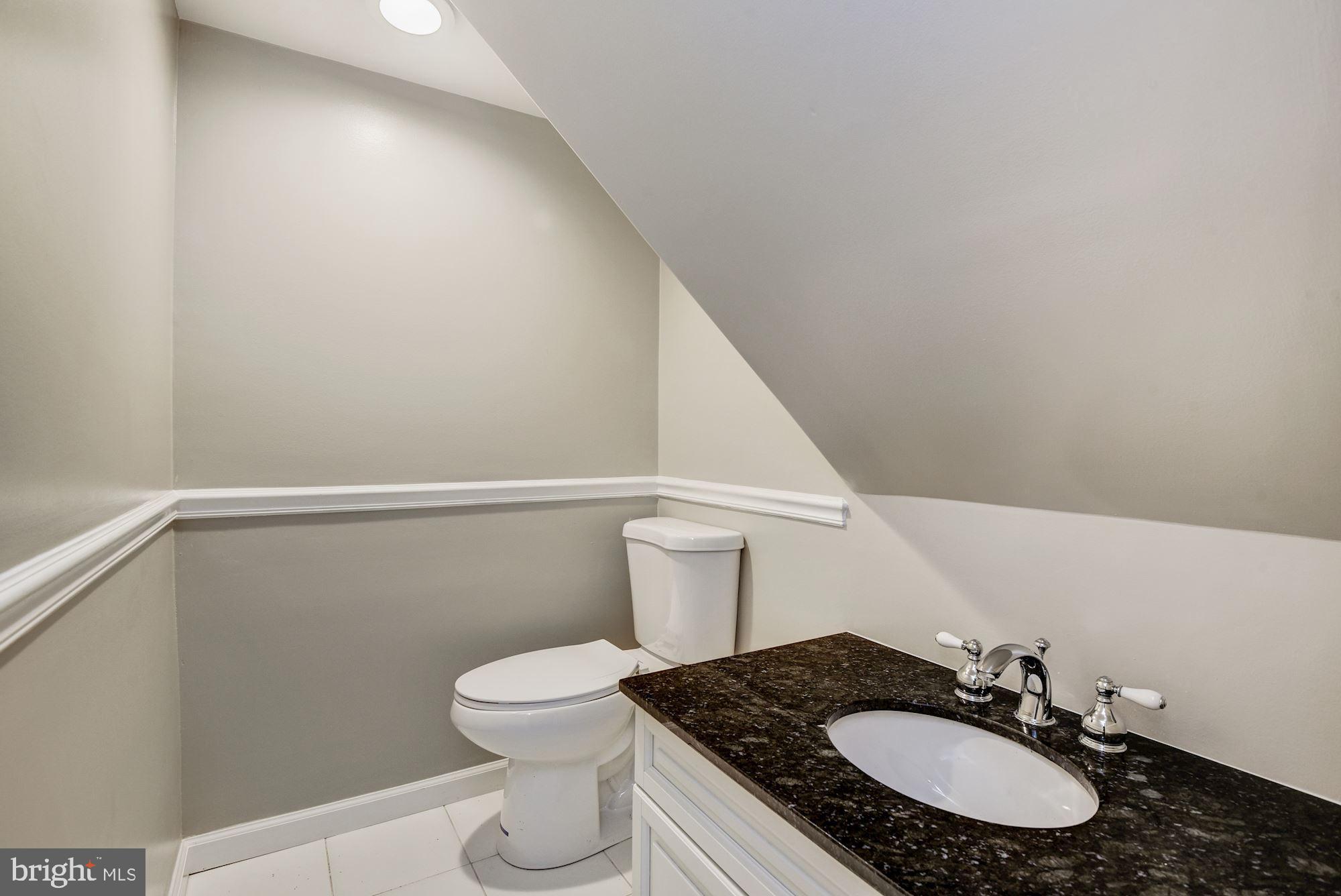 15020 Wellwood Road Silver Spring, MD 20905 - Photo 34 of 38 Kids bath under stairs, LL 2