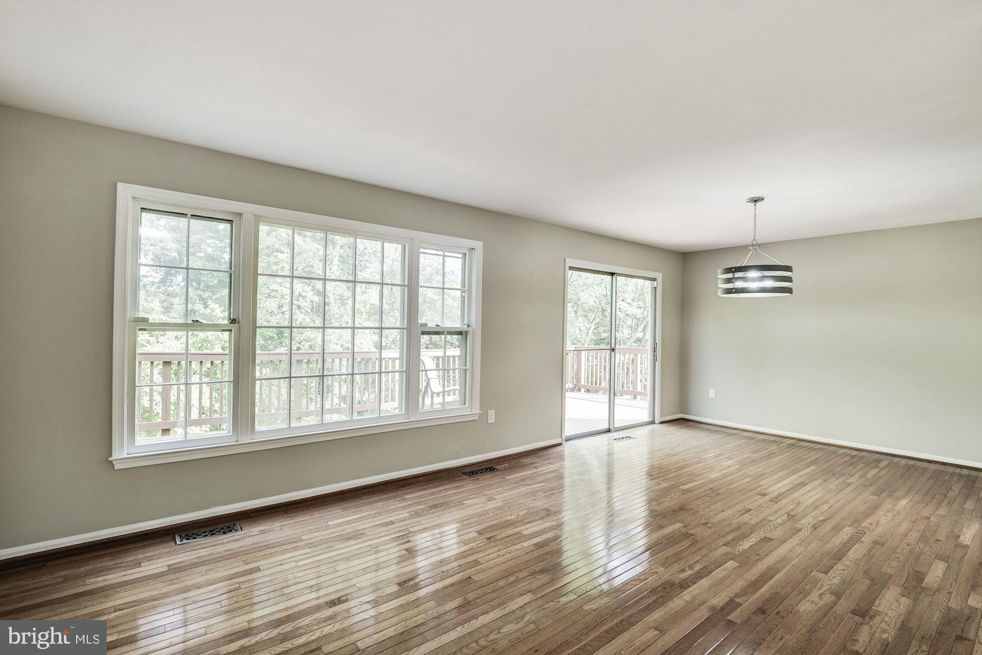 15020 Wellwood Road Silver Spring, MD 20905 - Photo 5 of 38 Living room/Dining room with hardwoods