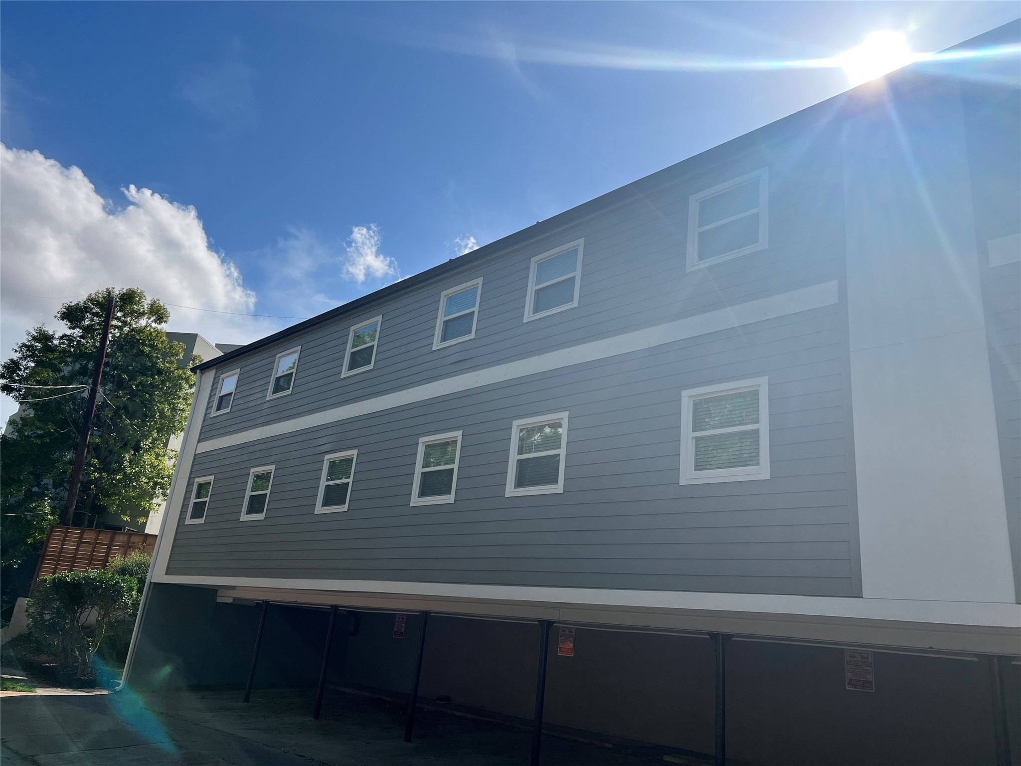 2017 Buffalo Terrace, Unit 15 Houston, TX 77019 - Photo 7 of 9 a front view of a house with a yard