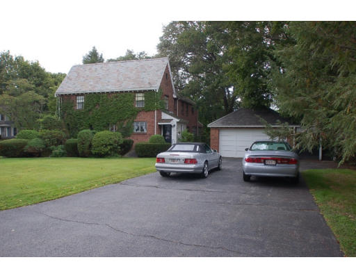 96 Pine Ridge Road Medford, MA 02155 - Photo 2 of 29 a car parked in front of a house