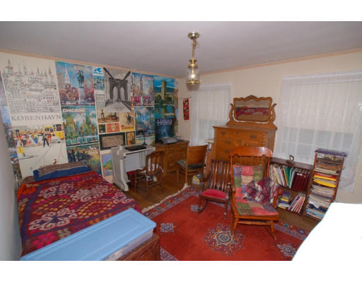 96 Pine Ridge Road Medford, MA 02155 - Photo 26 of 29 a living room with furniture and wooden floor