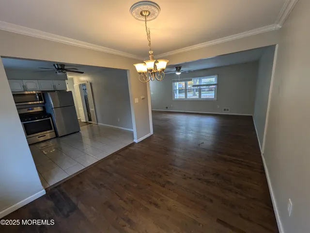 a view of a livingroom with a hard wood floor