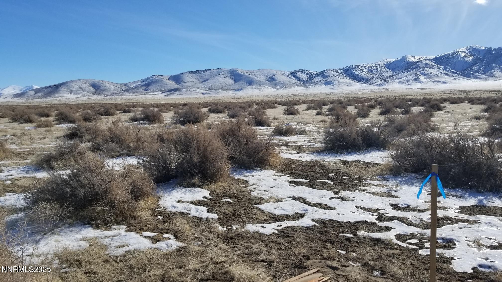827023 West Star Peak Road Imlay, NV 89418 - Photo 7 of 16 a view of a yard with wooden fence