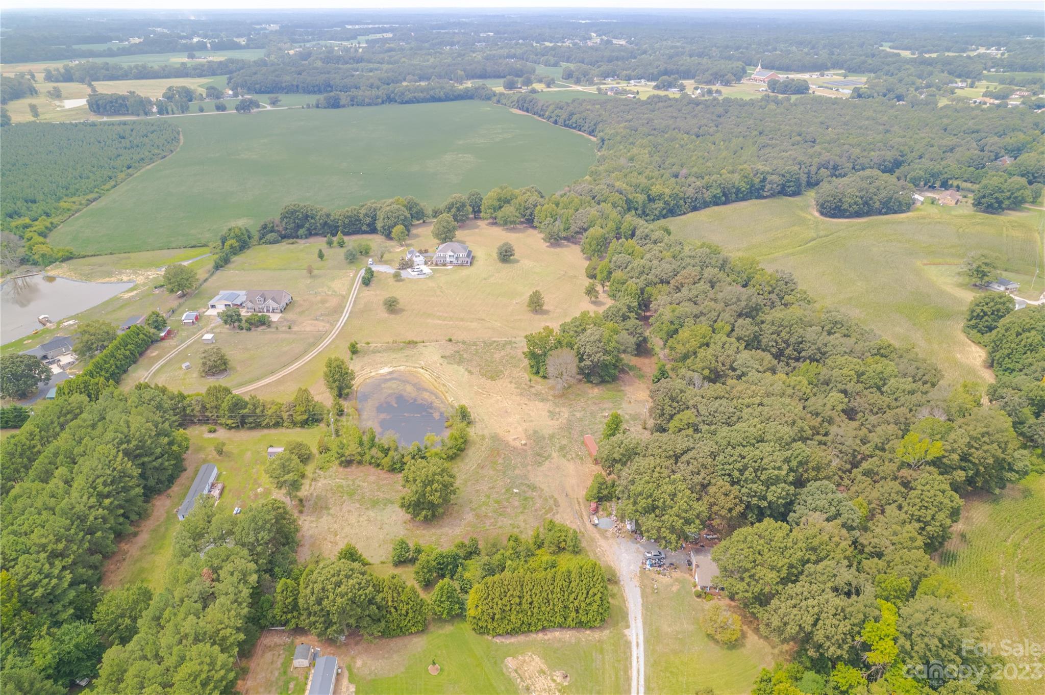 1131 Sikes Mill Road Monroe, NC 28110 - Photo 11 of 43 a view of a lake with a mountain